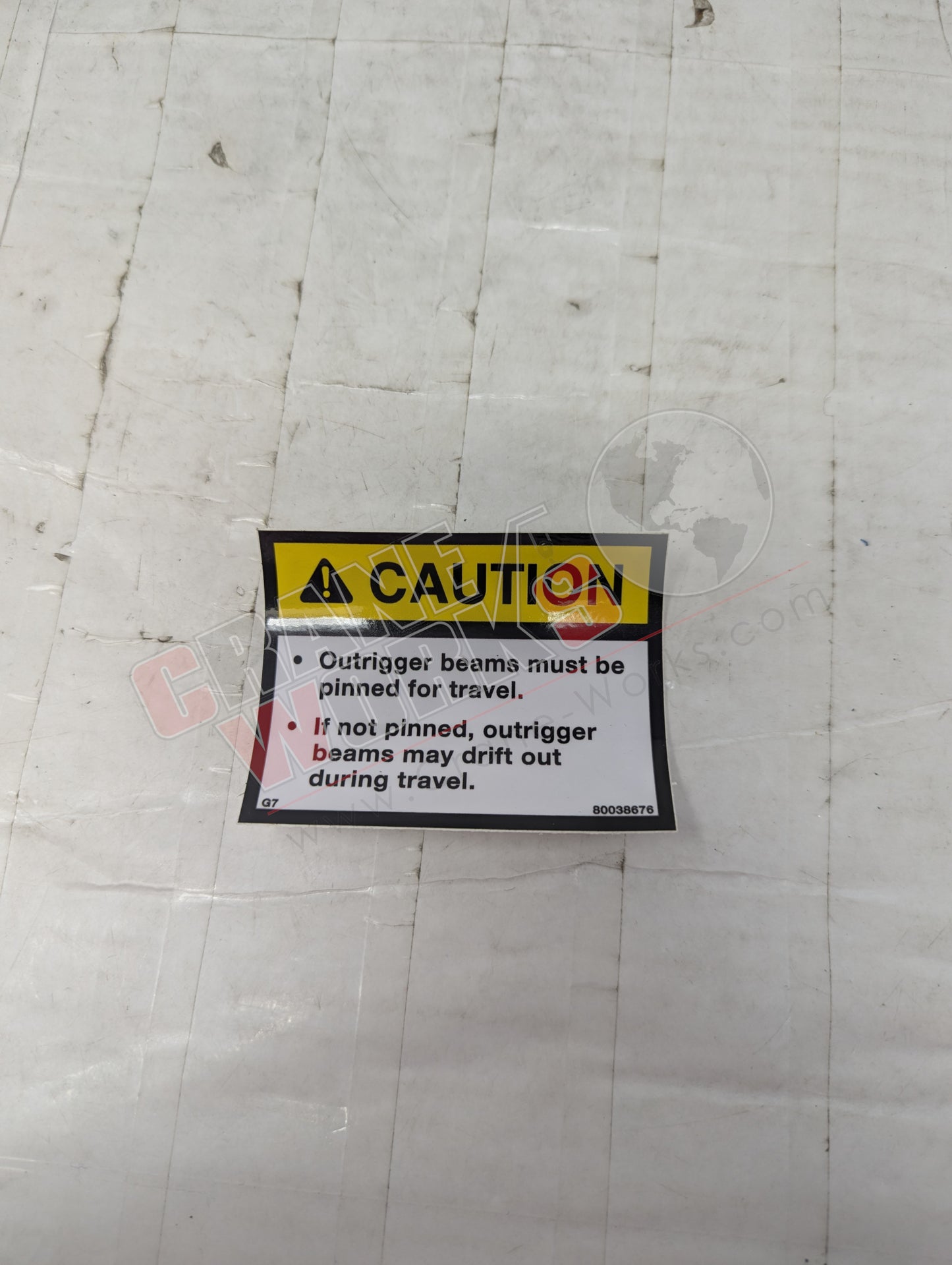 Picture of 80038676, a New Decal-Caution-Pinned Outrigger, angle 2.