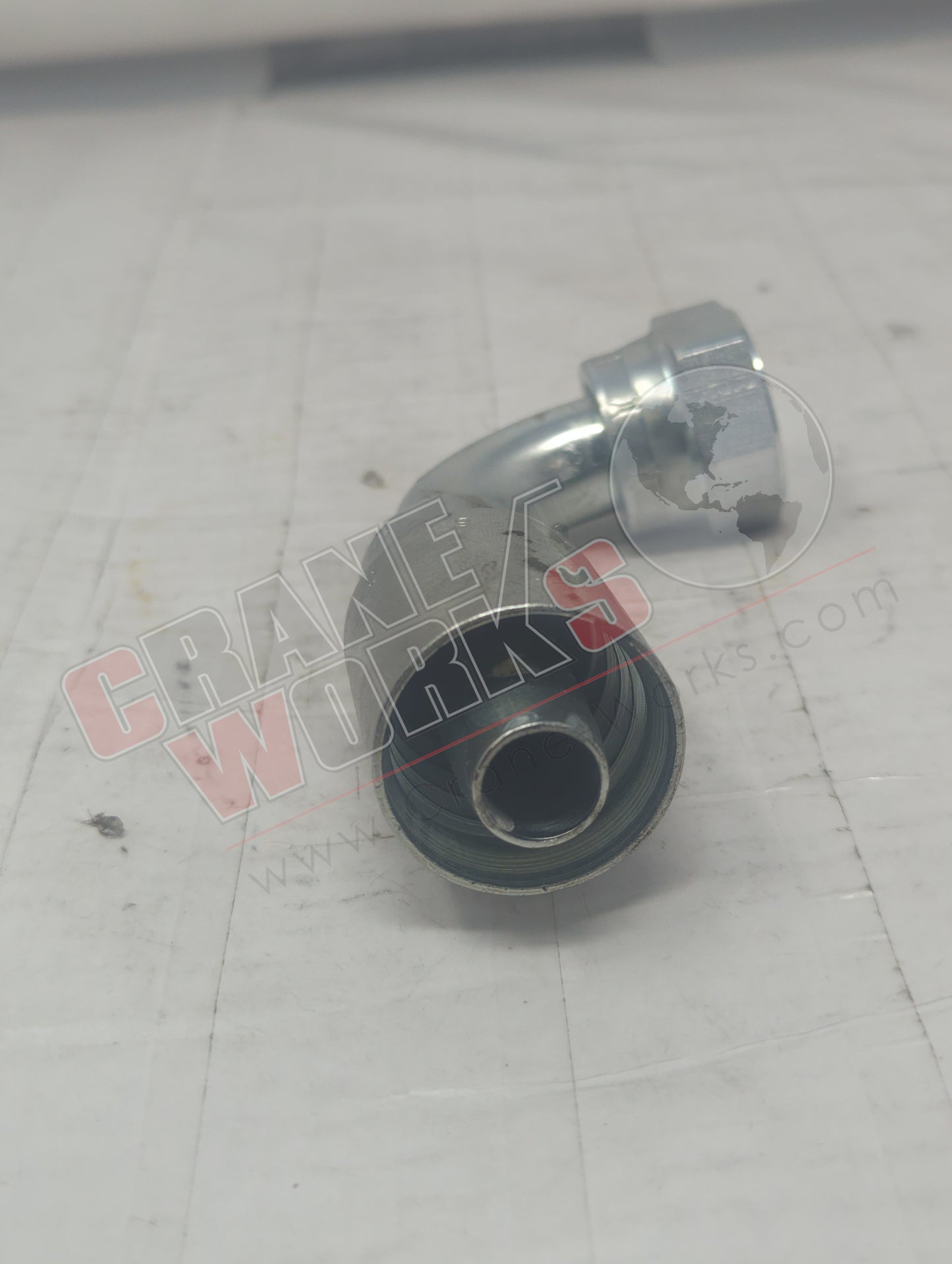 1J977-12-12 | New Hose Fitting, 12 Orfs-90