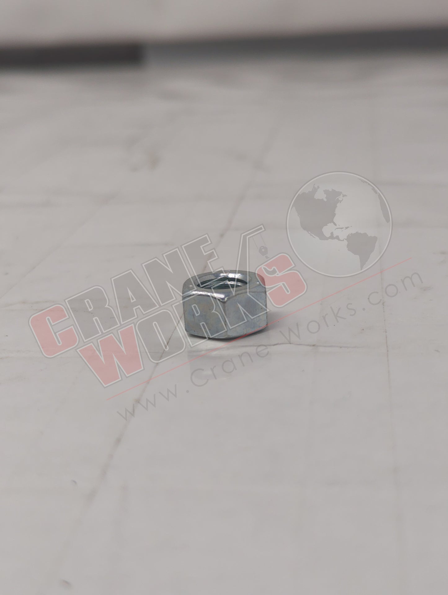 2005.061000 | New Nut; Hex Nc 0.38 *Note*