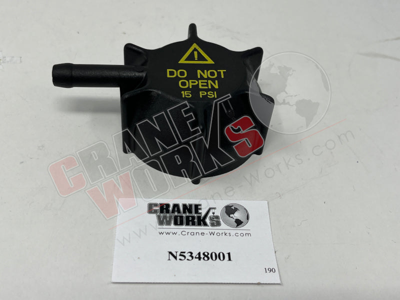 Picture of new reservoir tank cap, second angle.