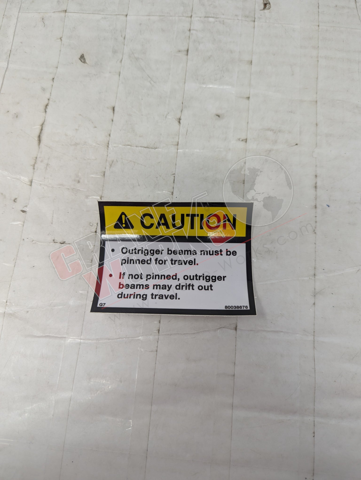 Picture of 80038676, a  New Decal-Caution-Pinned Outrigger, angle 2.