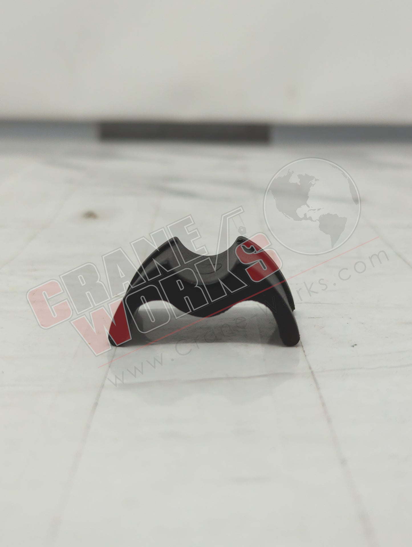 8916985 | New Spacer / Hold Down