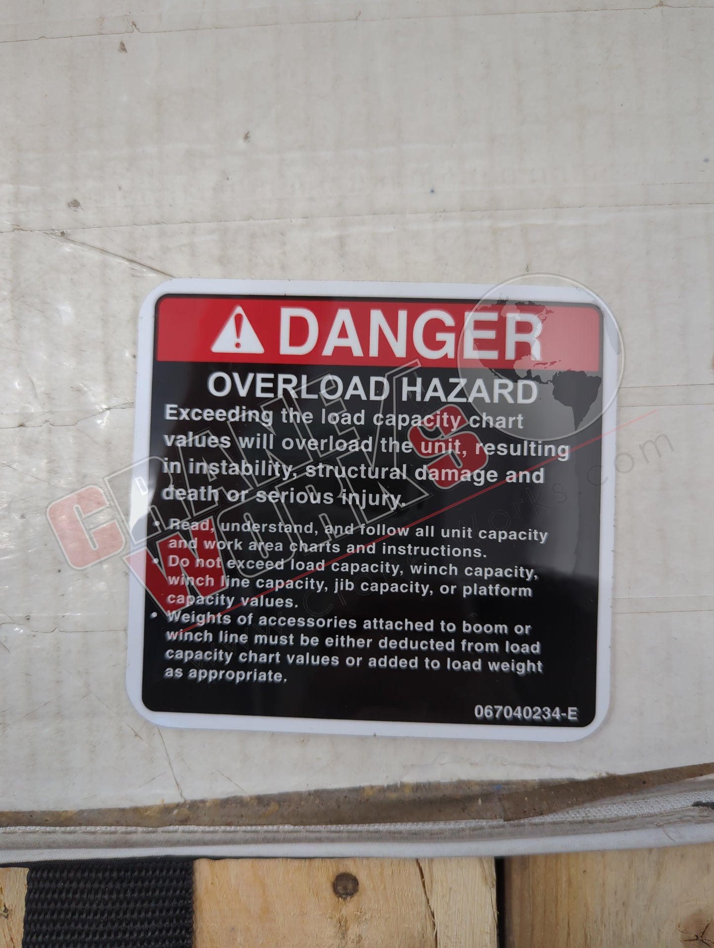 067040234 | New Overload Hazard Danger Decal