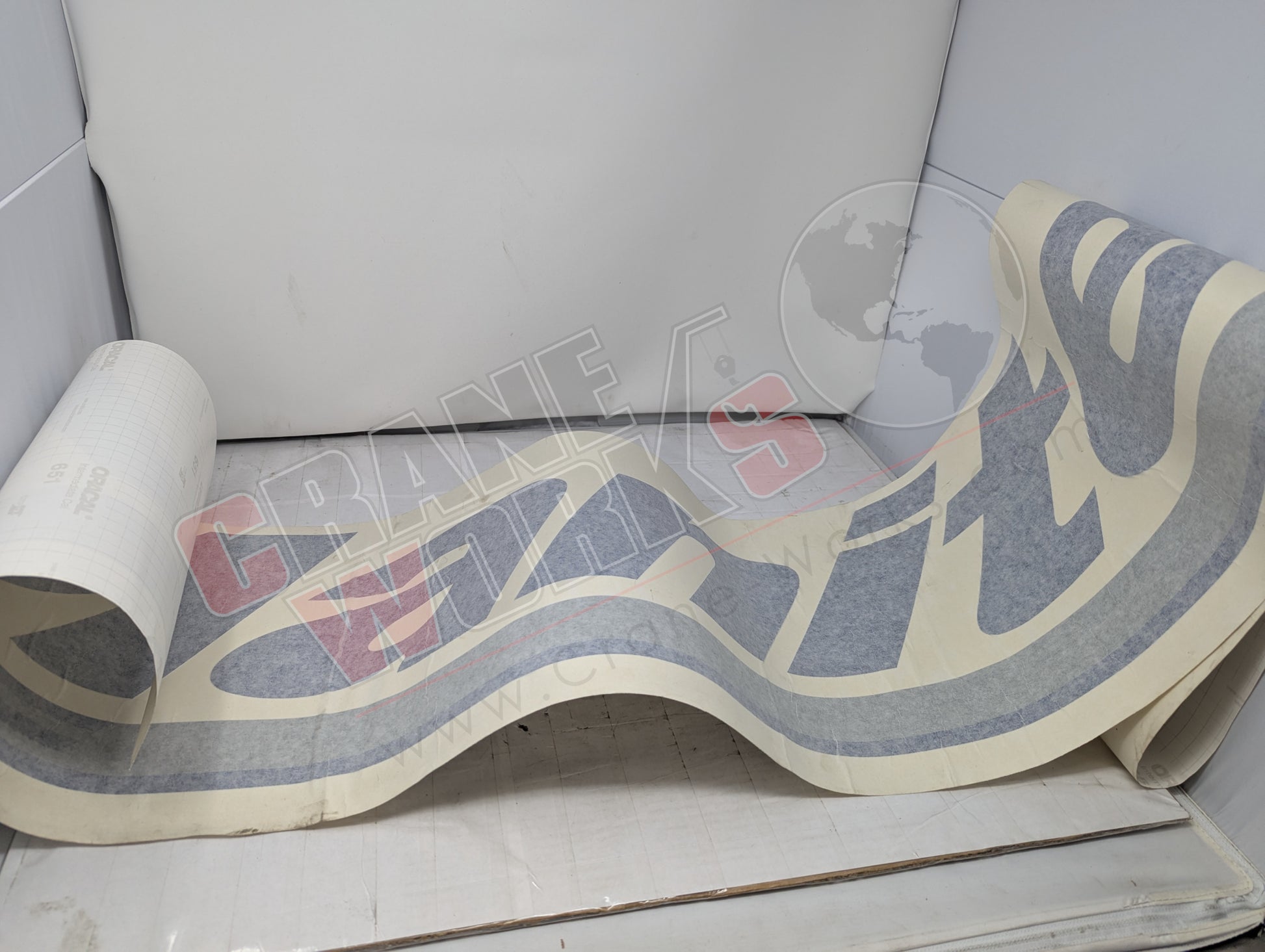 Picture of 4000782.004, a  New Manitex Decal Arrow Logo 82 In, angle 2.
