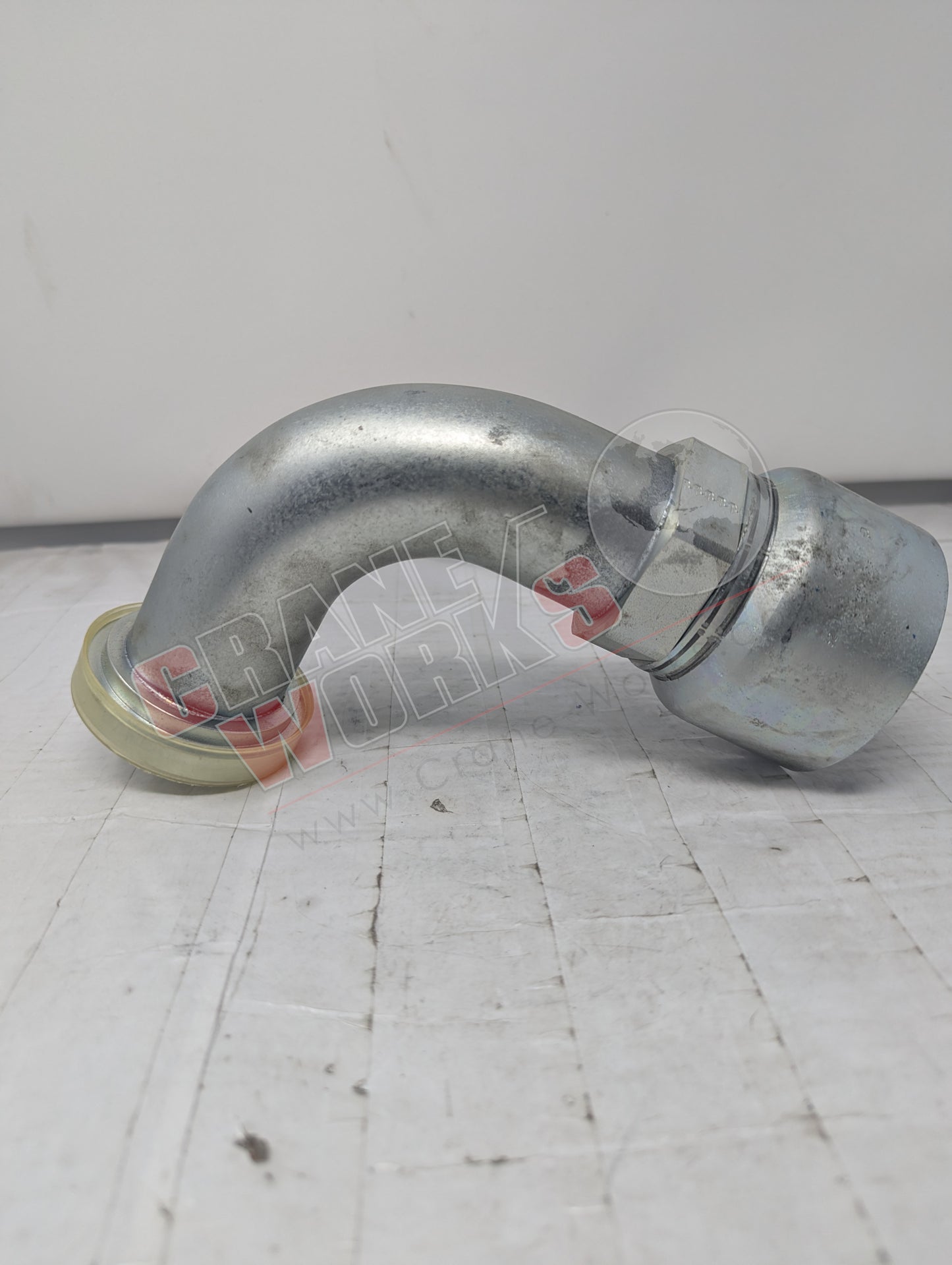Picture of 11943-32-32, a  New Sae Cd 61 Flg 90D Elbow 2" Flg X 2" Hos, angle 3.