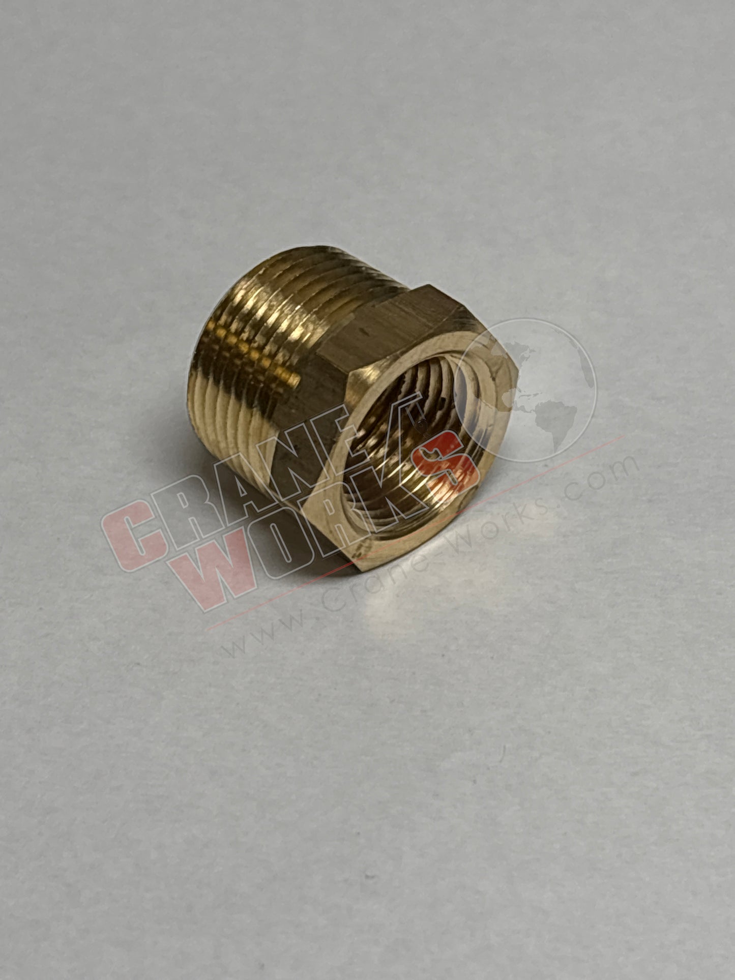 Picture of 110Ed, a  New 3/4 X 1/2 Bushing Brass Pipe Fitting, angle 2.