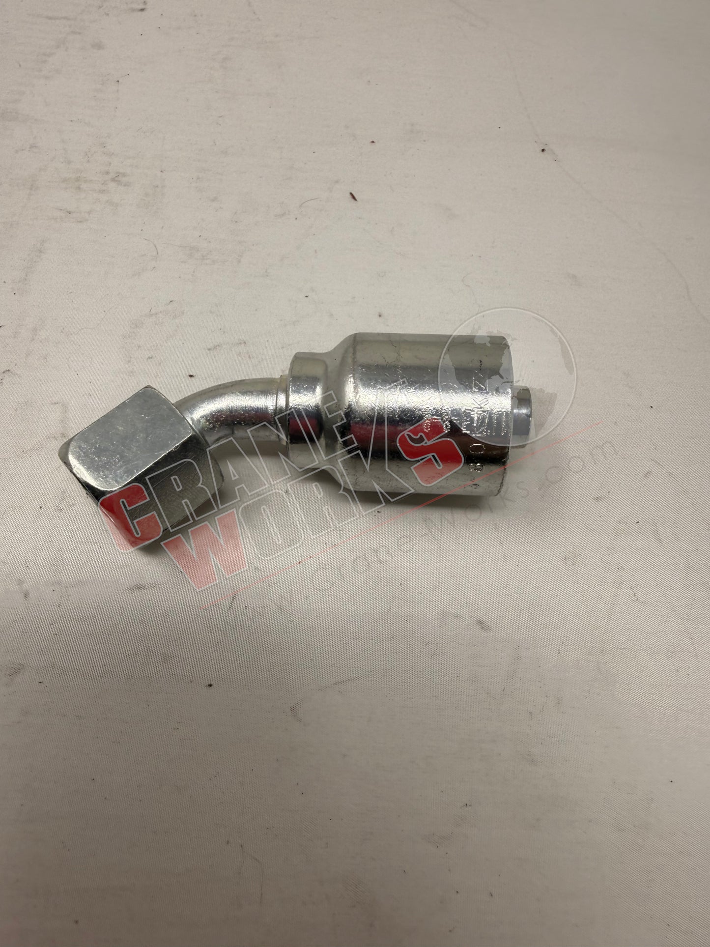 Picture of 1J943-06-04, a  New Crimp Fitting, angle 2.