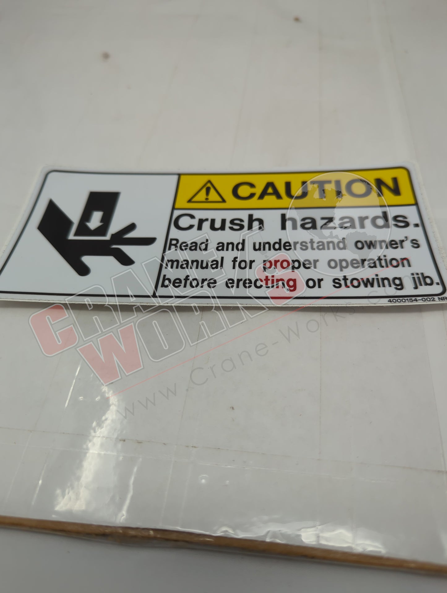 4000154.002 | New Decal Caution Jib Stowing