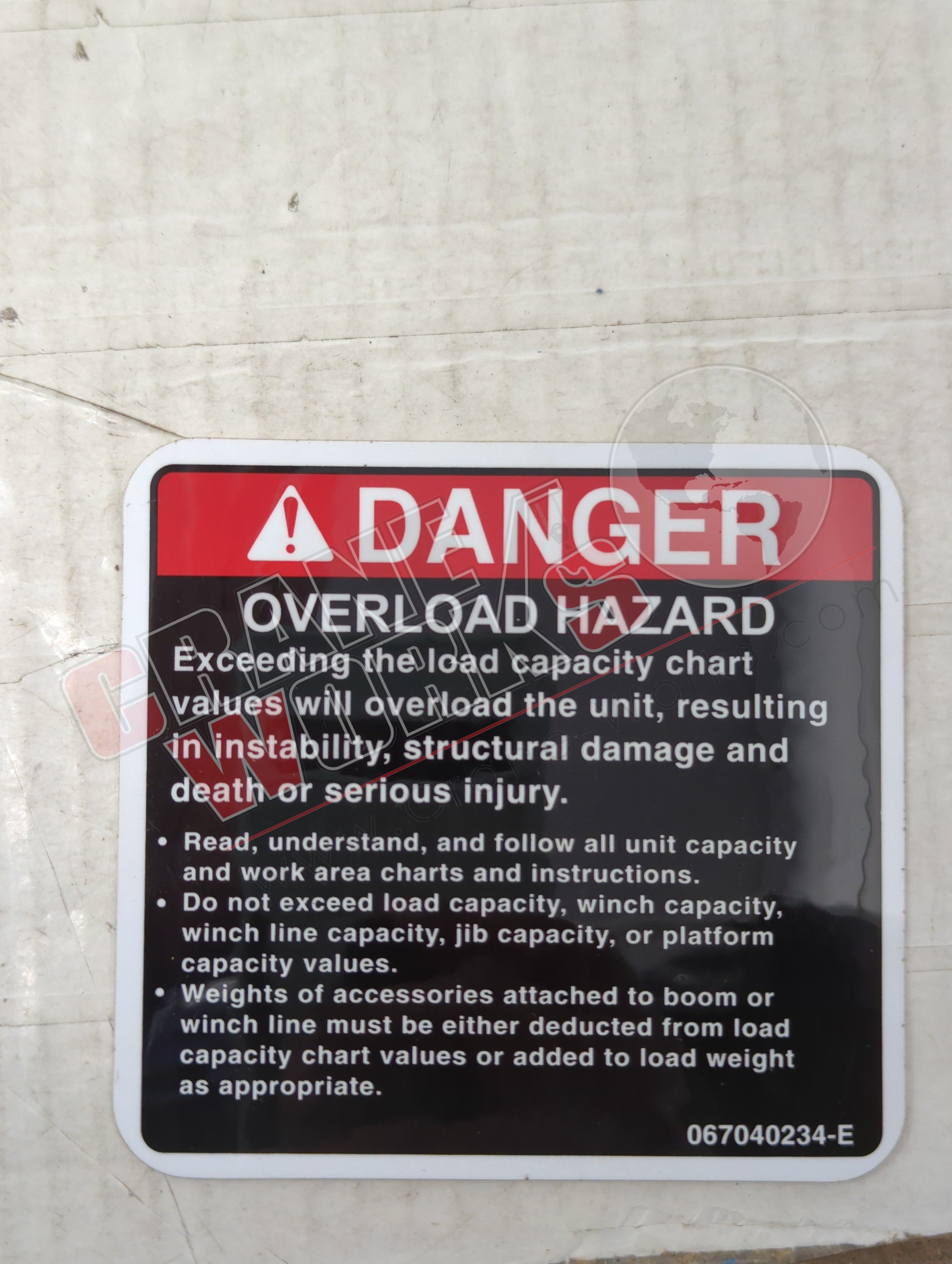067040234 | New Overload Hazard Danger Decal – CraneWorks
