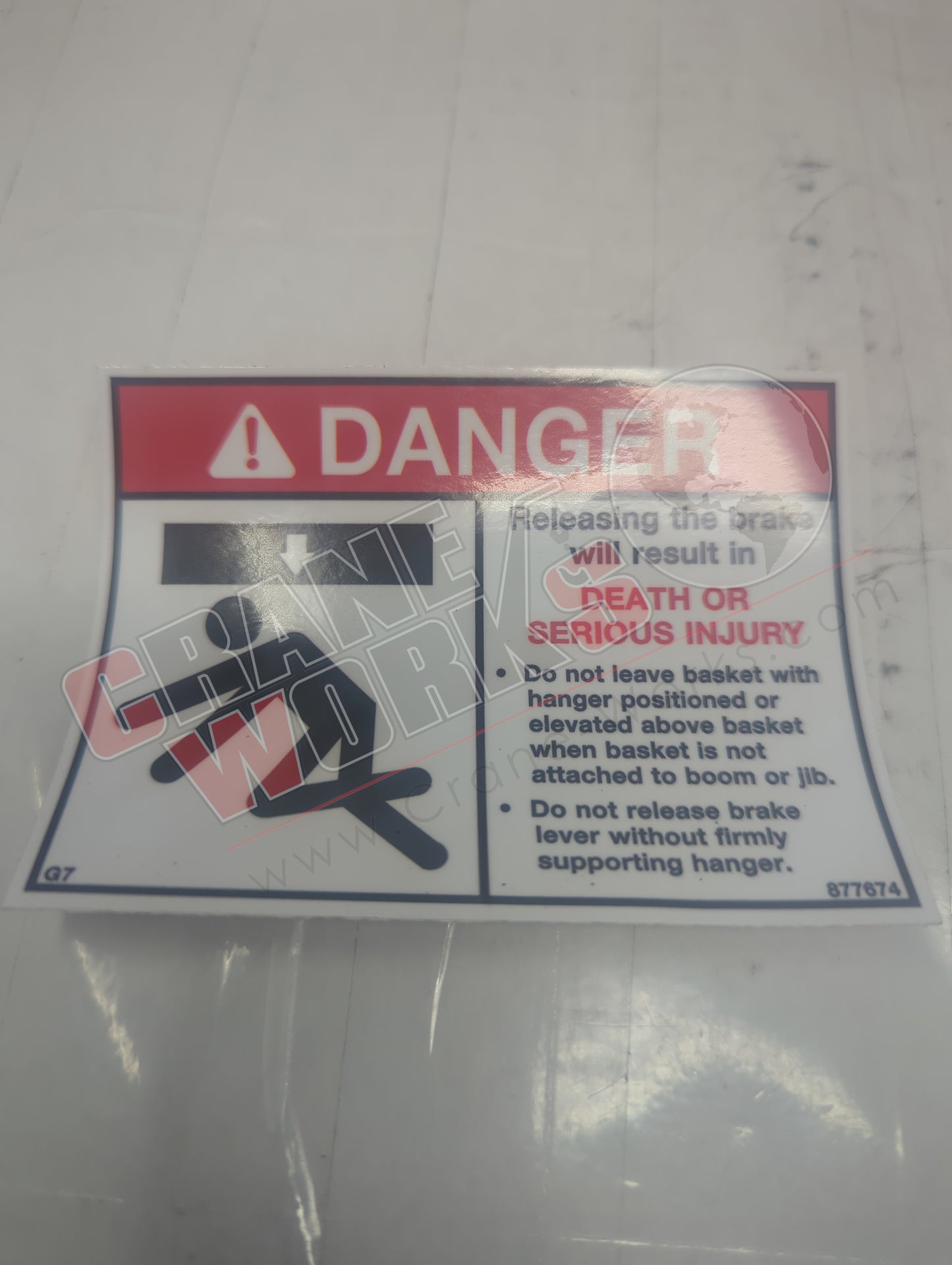 877674 | New Decal - Danger Releasing Brake