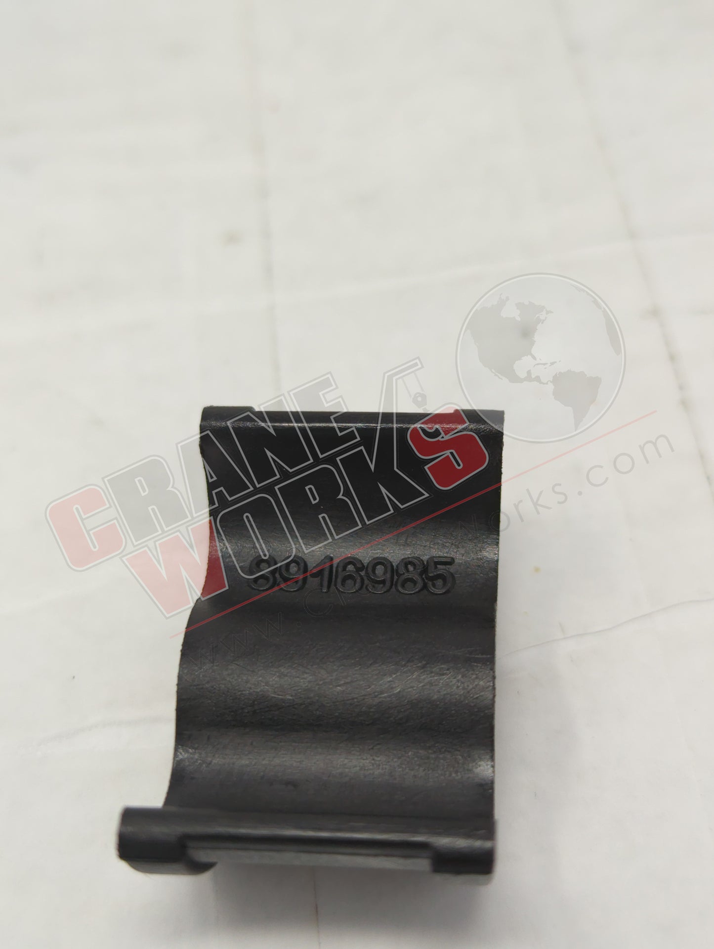 8916985 | New Spacer / Hold Down