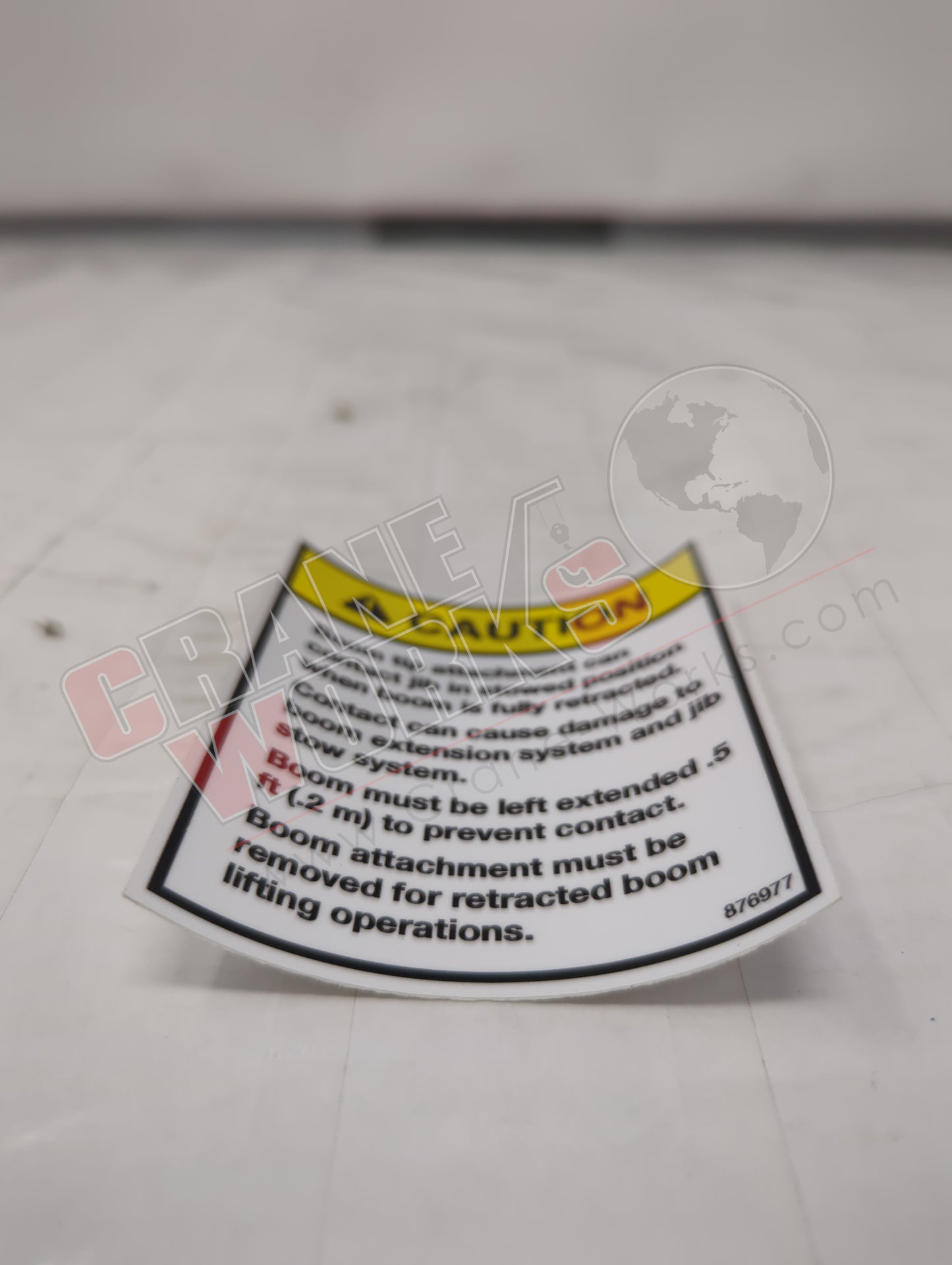 Picture of 876977, a  New Decal - Caution Boom Attachment.