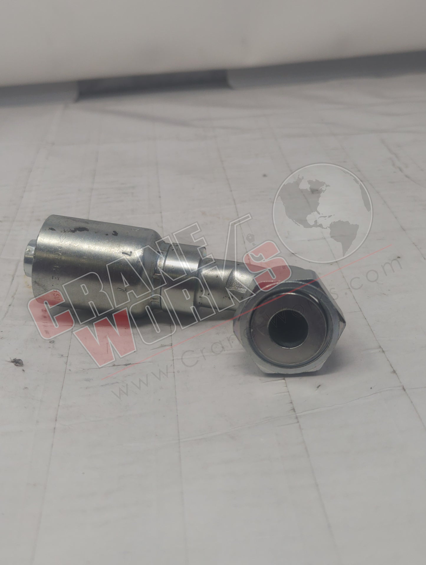 1J977-12-12 | New Hose Fitting, 12 Orfs-90