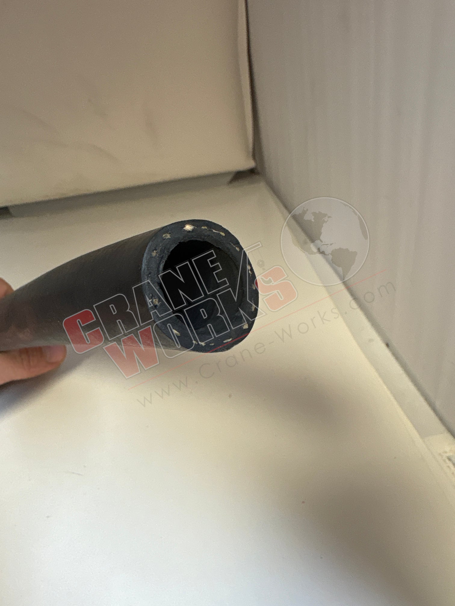 Picture of 7093-75200, a  New 3/4" Black General Serv Hose, angle 2.